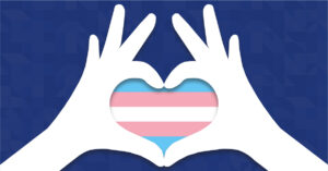 Hands forming a heart with the trans flag in the middle